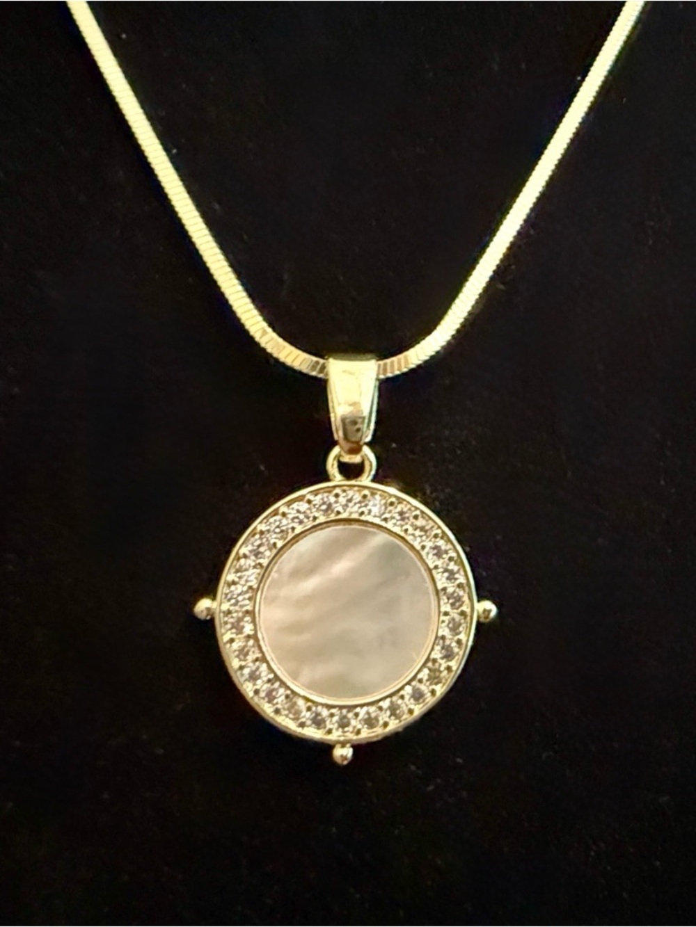 14 k yellow gold / s.s. (925) silver necklace with gold cz & m. of pearl charm.